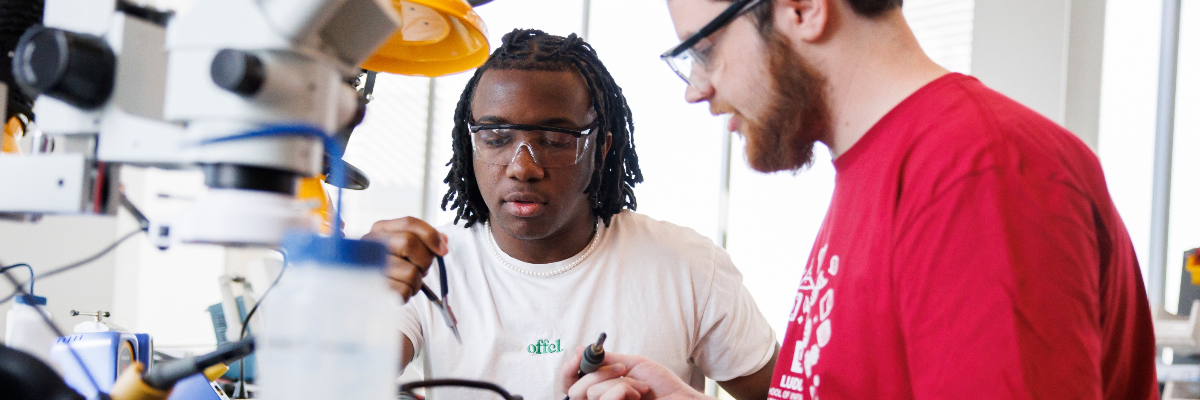 Two IU Bloomington students working on robotics at the Luddy school of Informatics, Computing, and Engineering in Bloomington, Indiana.